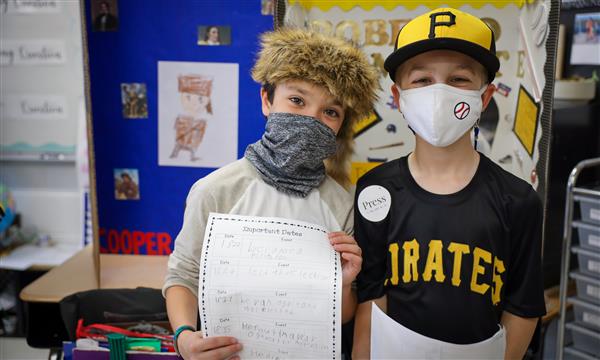 Students dressed as David Crockett and Roberto Clemente